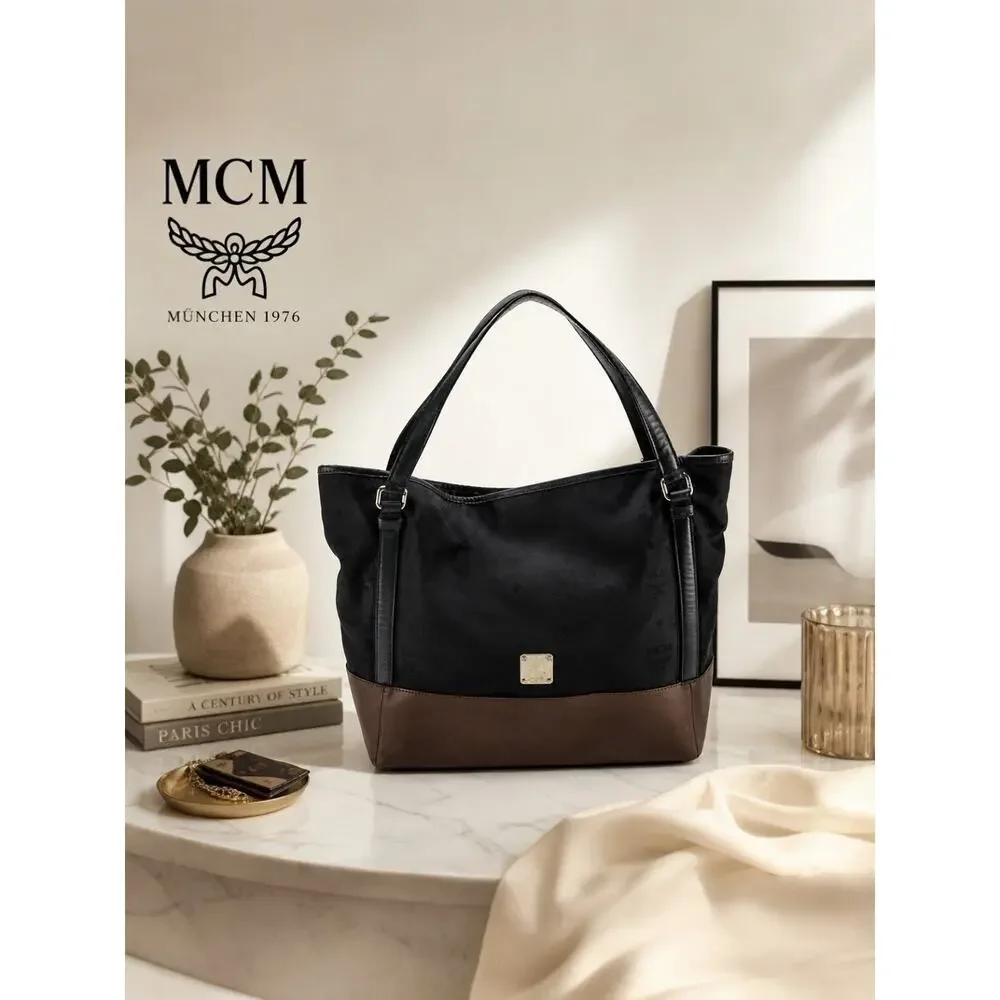 Authenticated MCM Black Hobo Visetos Canvas & Calfskin Leather Purse